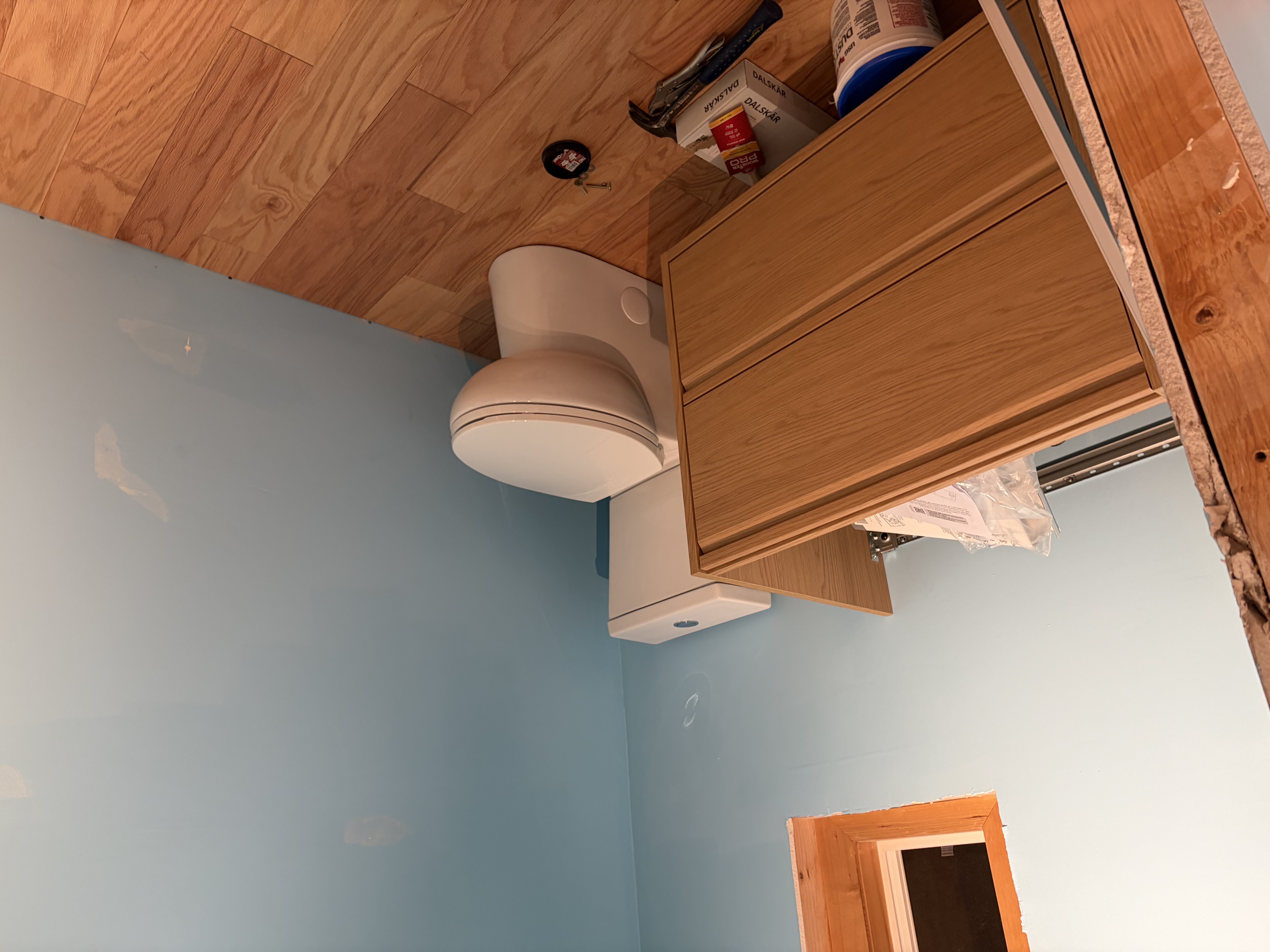 Remodeled bathroom with new vanity and toilet