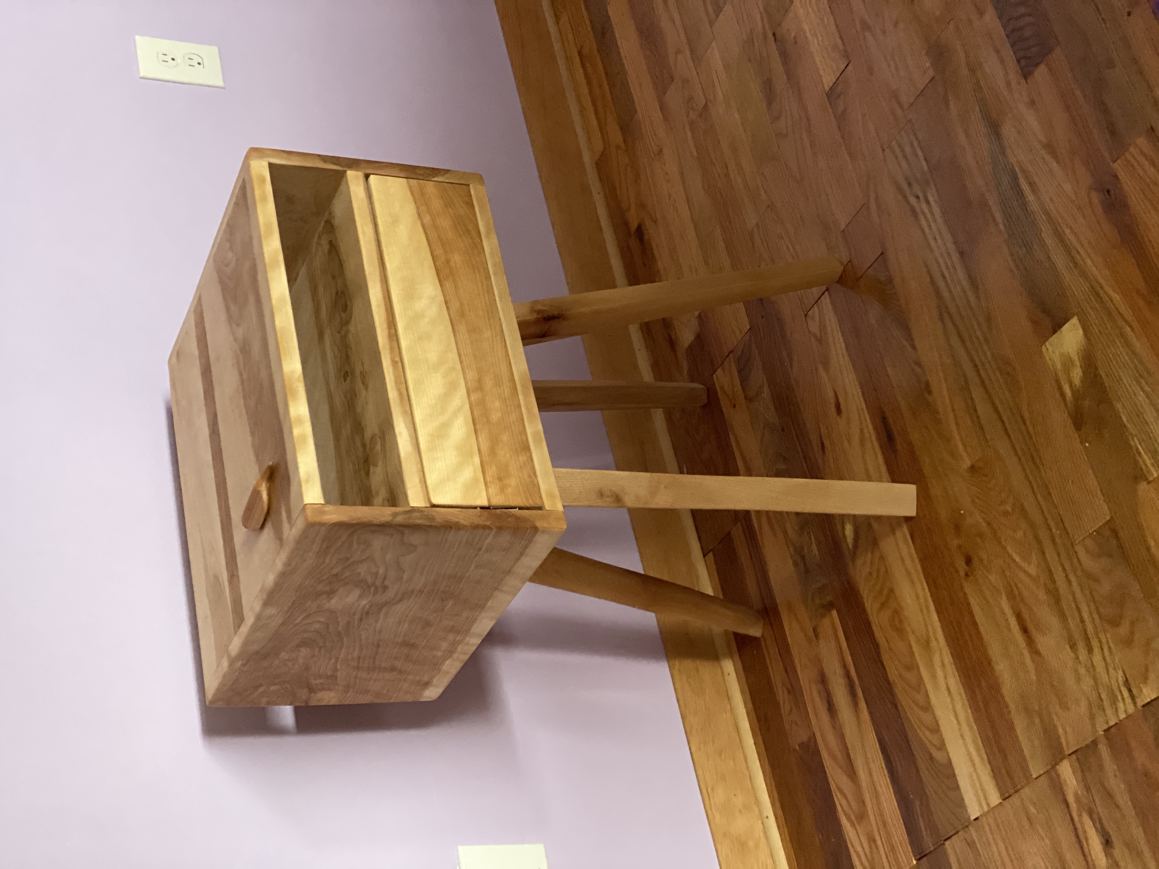 Handcrafted wood nightstand with tapered legs